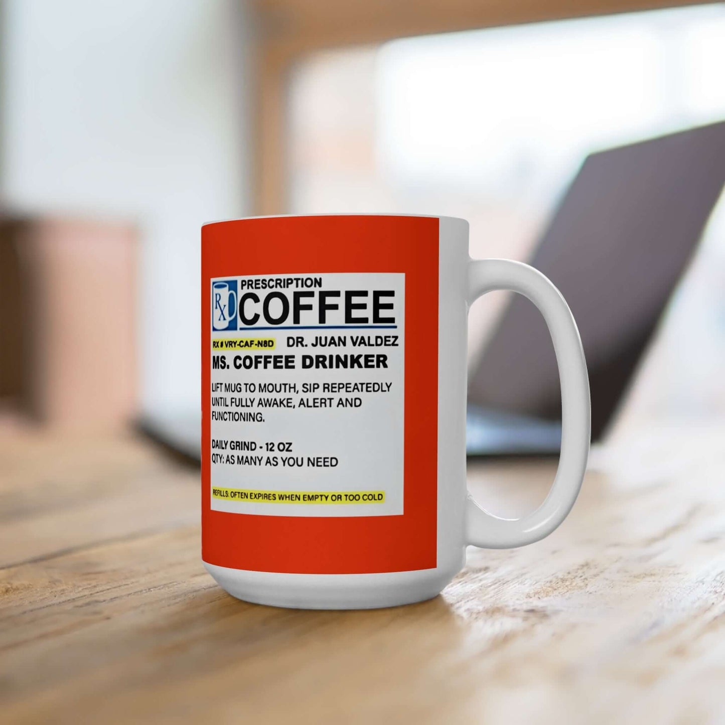 Prescription Coffee Mug - For Her (11oz, 15oz) with humorous text, made of durable white ceramic, on a wooden table with a blurred background.