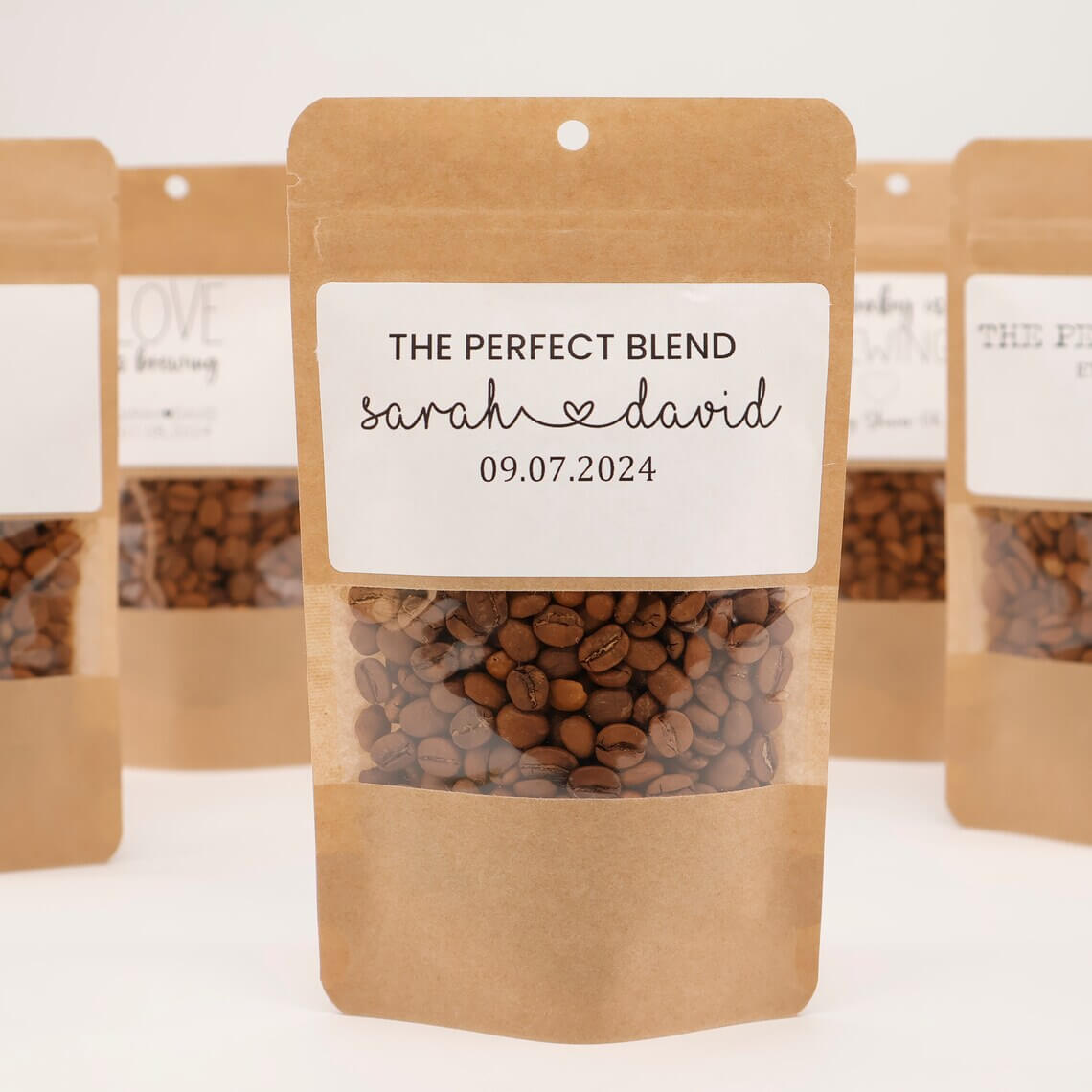 Beautifully packaged coffee favor bags for weddings, personalized with names and date, ideal for Wedding & Event Favors.